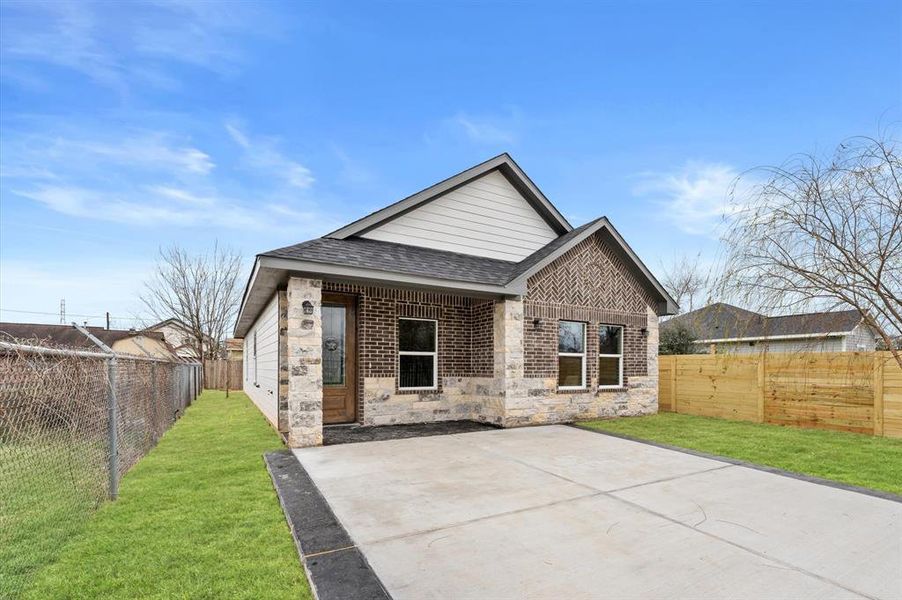 Home offers a large driveway offering plenty of space for parking and easy access to your home.