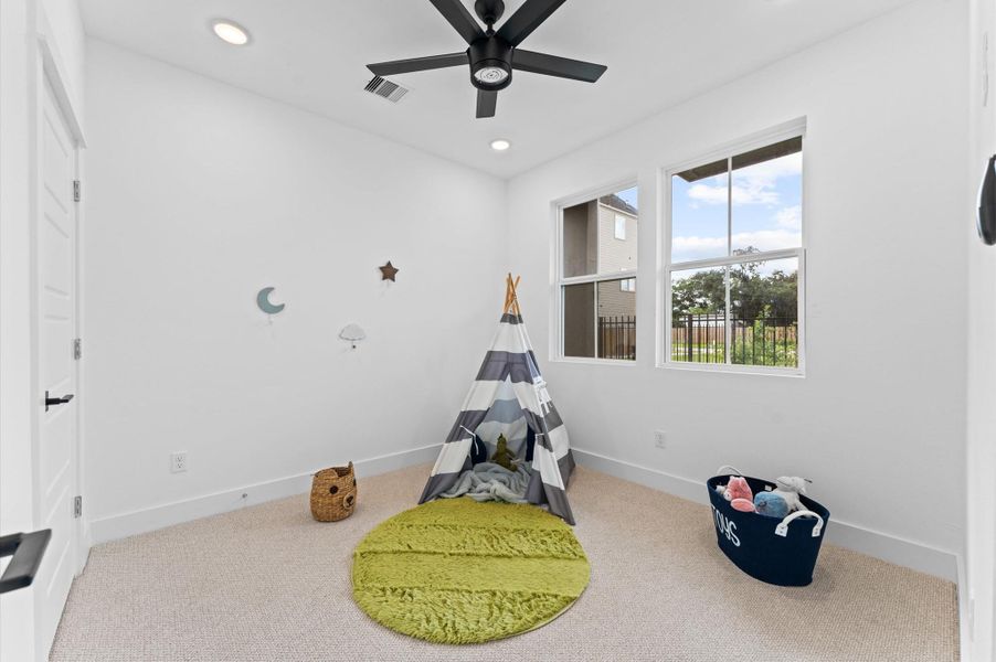 This inviting home features two spacious secondary bedrooms located on the first floor, offering privacy and convenience for guests, family members, or a home office setup. A full bathroom is thoughtfully positioned nearby, providing easy access and functionality. Whether used for multi-generational living or flexible space needs, this layout enhances comfort and accessibility without compromising style.