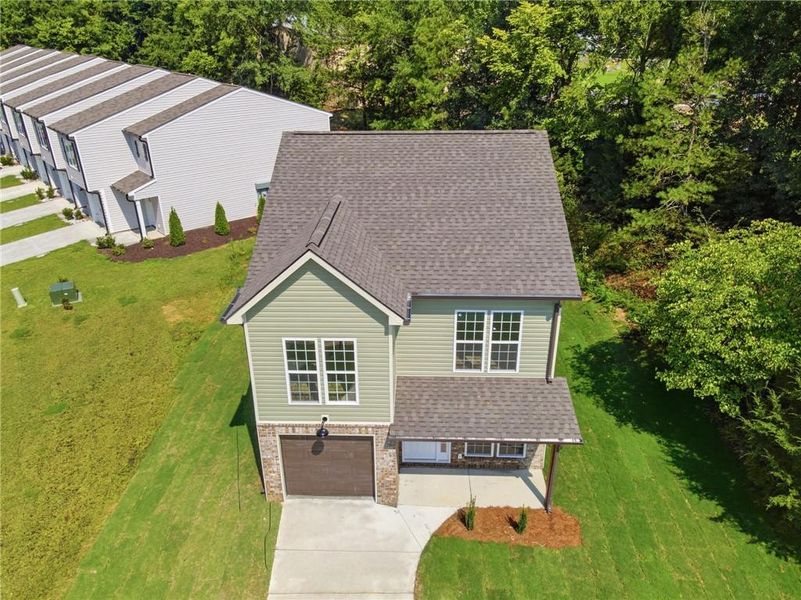 Front exterior of a new home in , Calhoun, GA, highlighting curb appeal (Image 25). Front exterior of a new home in , Calhoun, GA, highlighting curb appeal (Image 25).