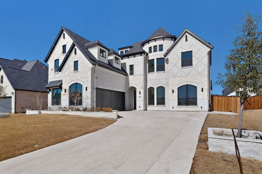 Front exterior of a new home in , Prosper, TX, highlighting curb appeal (Image 24).