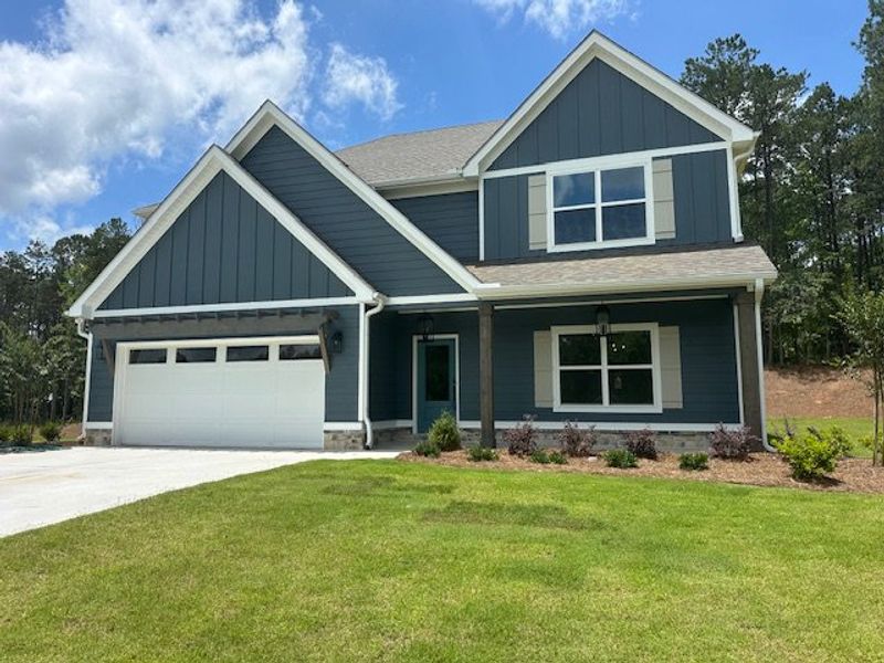 Front exterior of a new home in Sagebrook, Newnan, GA, highlighting curb appeal (Image 18).