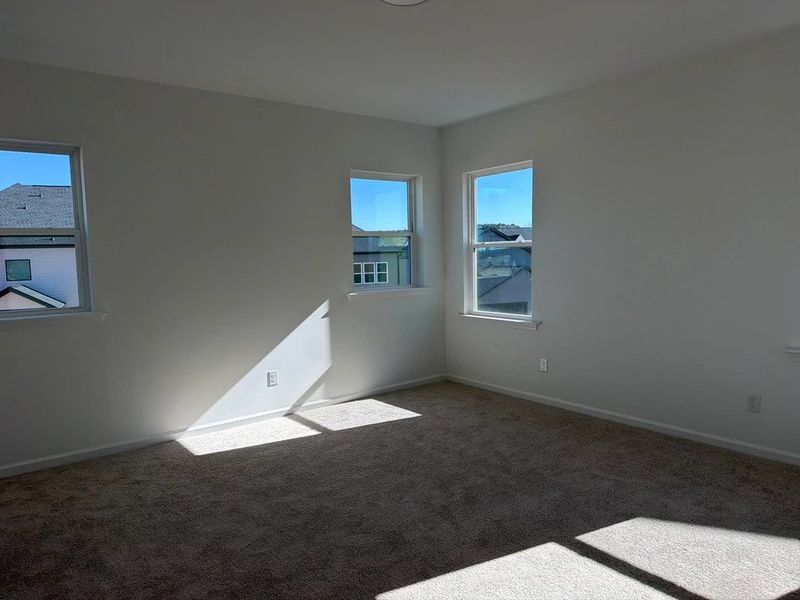 Primary Bed featuring the AW Collection® Sapphire - Confident style in layered textures and color.