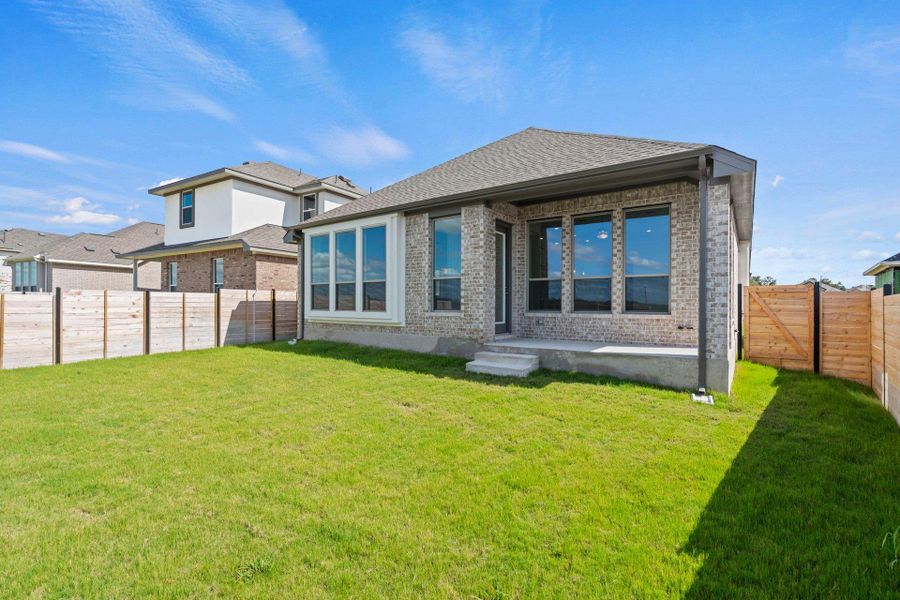 Rear of Home and Private Backyard