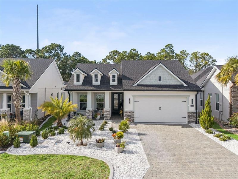 Front exterior of a new home in , Port Orange, FL, highlighting curb appeal (Image 26). Front exterior of a new home in , Port Orange, FL, highlighting curb appeal (Image 26).