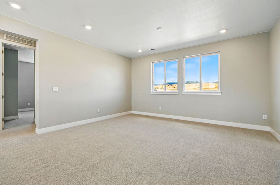 Spacious, unfurnished interior of a new home in Trailstone, Arvada (Image 32).