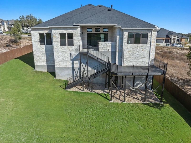 Exterior details and patio area of a home in Riverstone, Georgetown (Image 24).