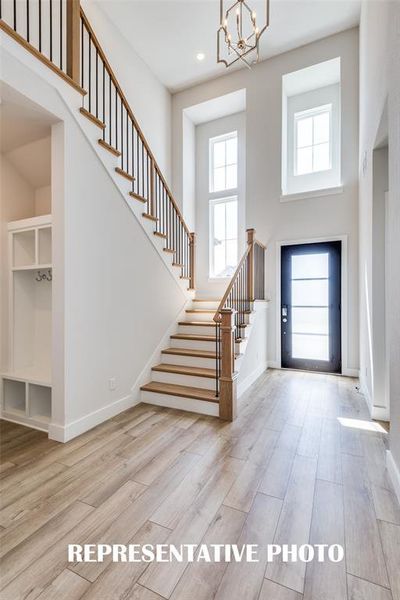This beautiful open, light filled entry is the perfect place to welcome friends and family into your fantastic new home!  REPRESENTATIVE PHOTO.