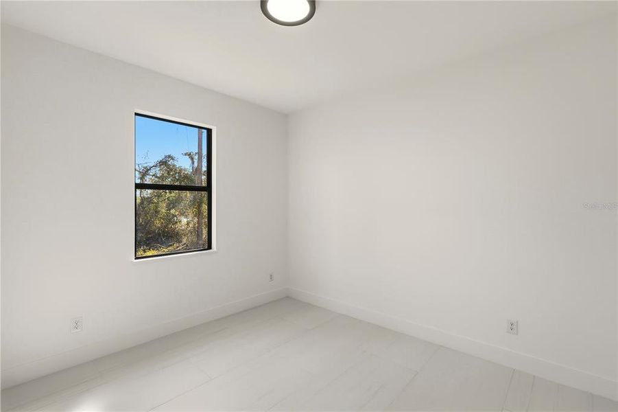 Spacious, unfurnished interior of a new home in , North Port (Image 24).