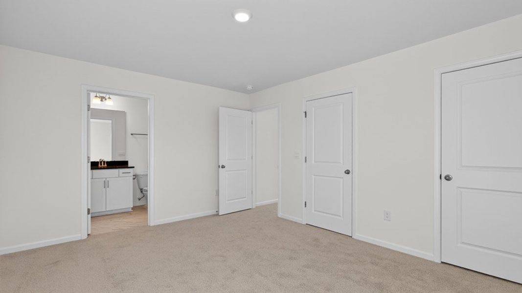 Representative unfurnished interior of a home built from the Hartwell by D.R. Horton in The Estates Park, Apex (Image 21).