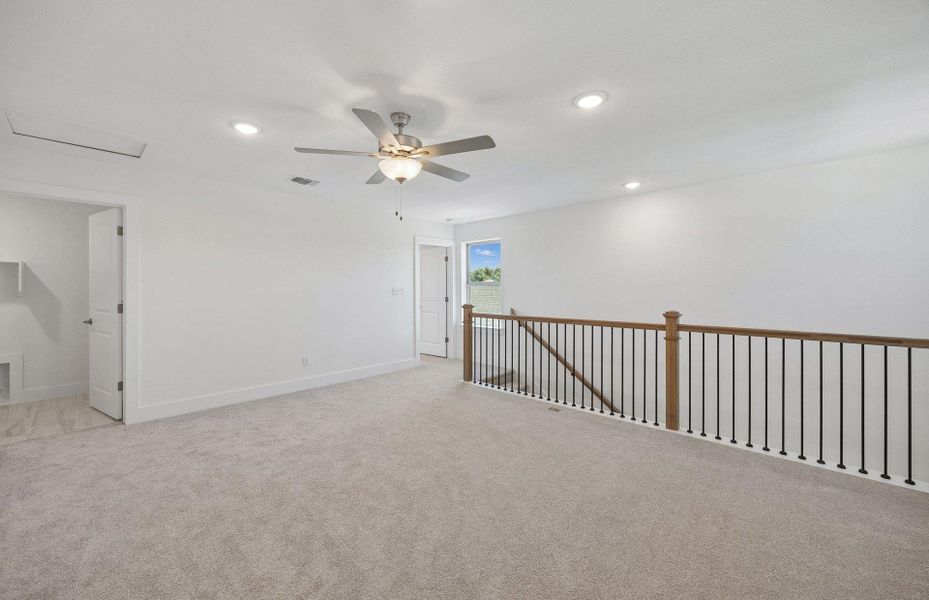 Spacious, unfurnished interior of a new home in Saddleback at Santa Rita Ranch, Liberty Hill (Image 19).