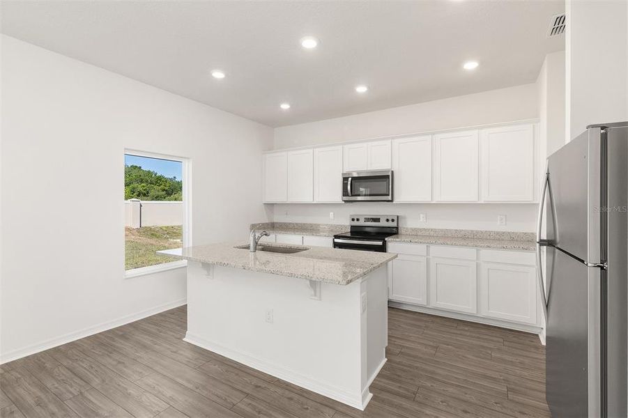 Furnished interior view inside a new home in Peach Crossings, Winter Haven (Image 7).