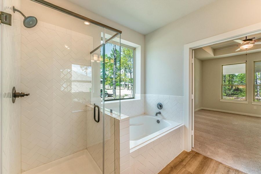 Furnished interior view inside a new home in Deer Pines, Conroe (Image 9).