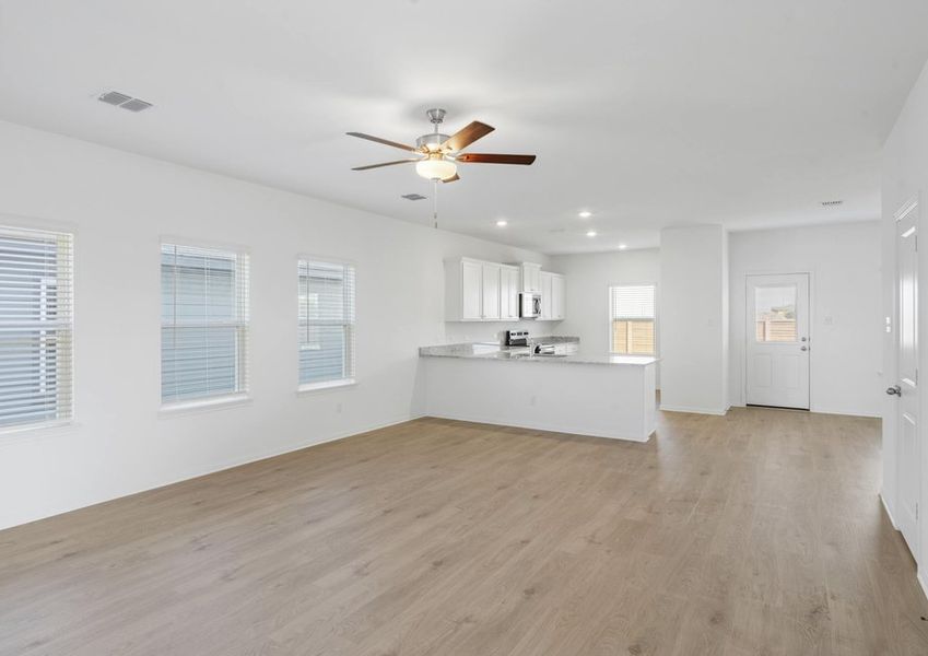 Spacious family room that leads to the kitchen