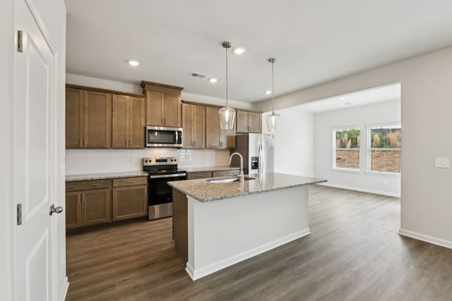 Furnished interior view inside a new home in Hawthorne Station, College Park (Image 5).