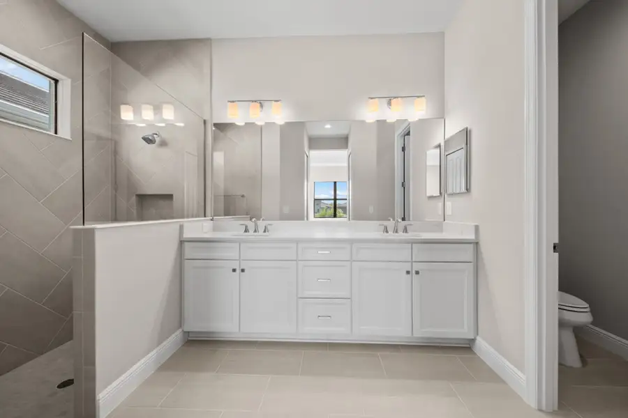 Furnished interior view inside a new home in SkySail, Naples (Image 7).