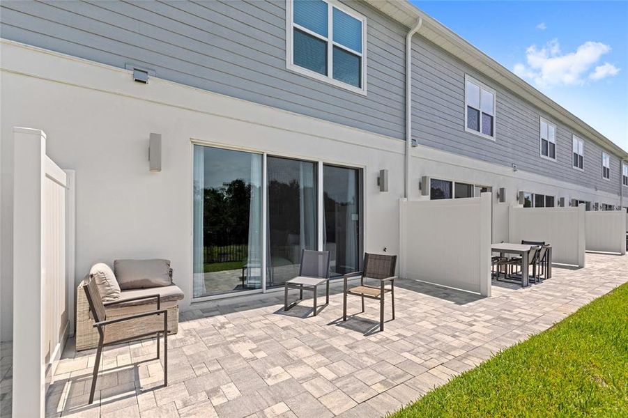 Front exterior of a new home in , Kissimmee, FL, highlighting curb appeal (Image 20).