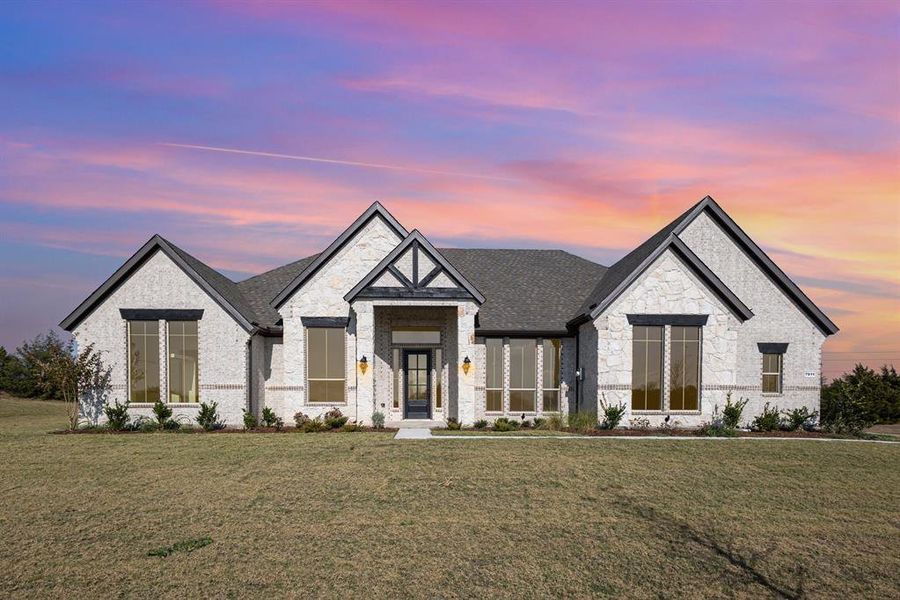 Front exterior of a new home in Sagebrush Addition, Midlothian, TX, highlighting curb appeal (Image 1).