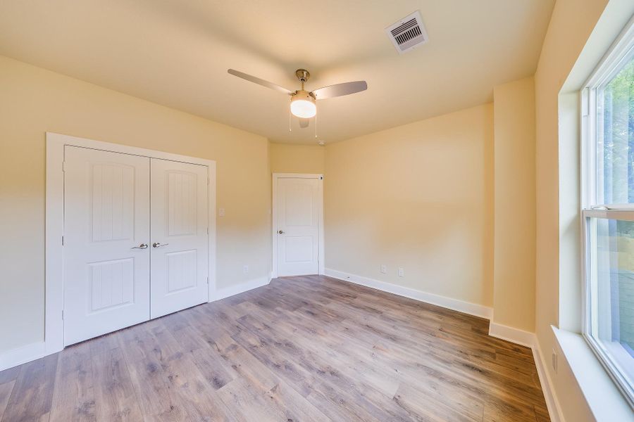 Secondary bedroom one with spacious closet, bright and inviting space ready for your personal touch. Don’t miss out! Secondary bedroom one with spacious closet, bright and inviting space ready for your personal touch. Don’t miss out!