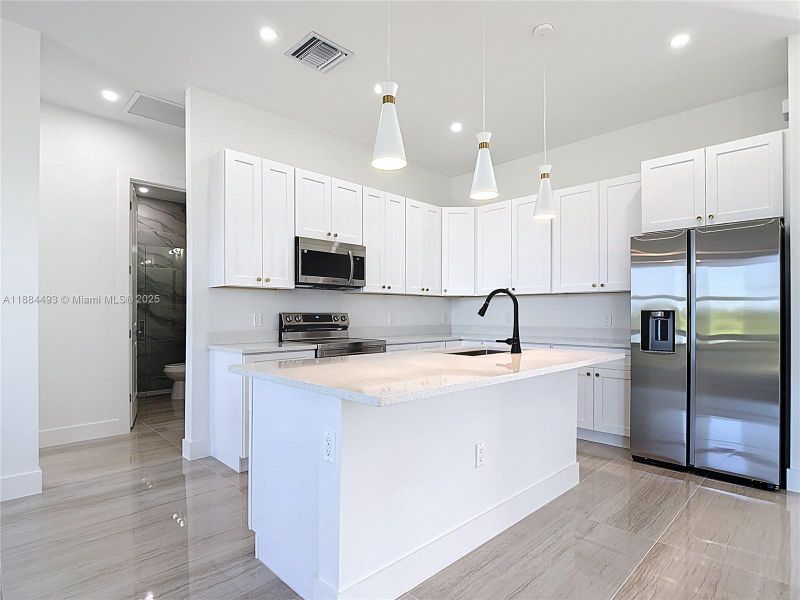 Furnished interior view inside a new home in , Lehigh Acres (Image 8). Furnished interior view inside a new home in , Lehigh Acres (Image 8).