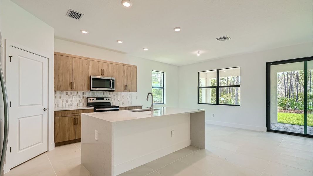 Representative furnished interior of a home built from the Avon by D.R. Horton in Preserves at Park Trace, Stuart (Image 5).
