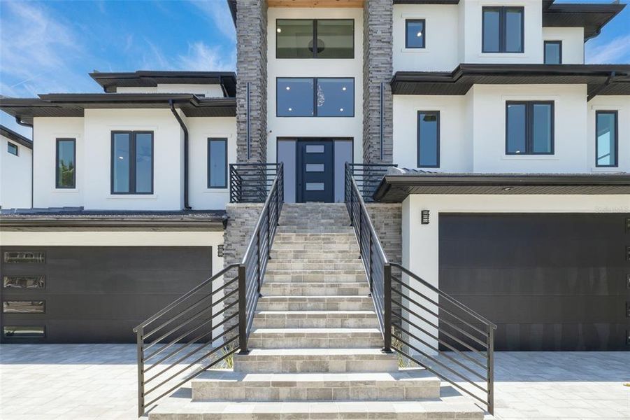 Front exterior of a new home in , Gulfport, FL, highlighting curb appeal (Image 30). Front exterior of a new home in , Gulfport, FL, highlighting curb appeal (Image 30).