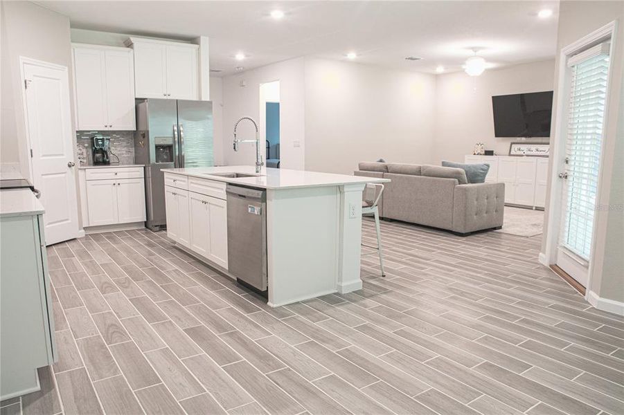 Furnished interior view inside a new home in , Gainesville (Image 8).