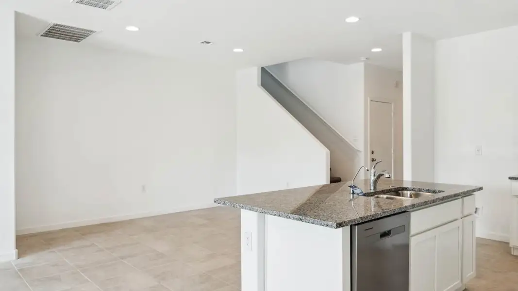 Representative furnished interior of a home built from the Mitchell by D.R. Horton in Upper Canyon, Phoenix (Image 10).