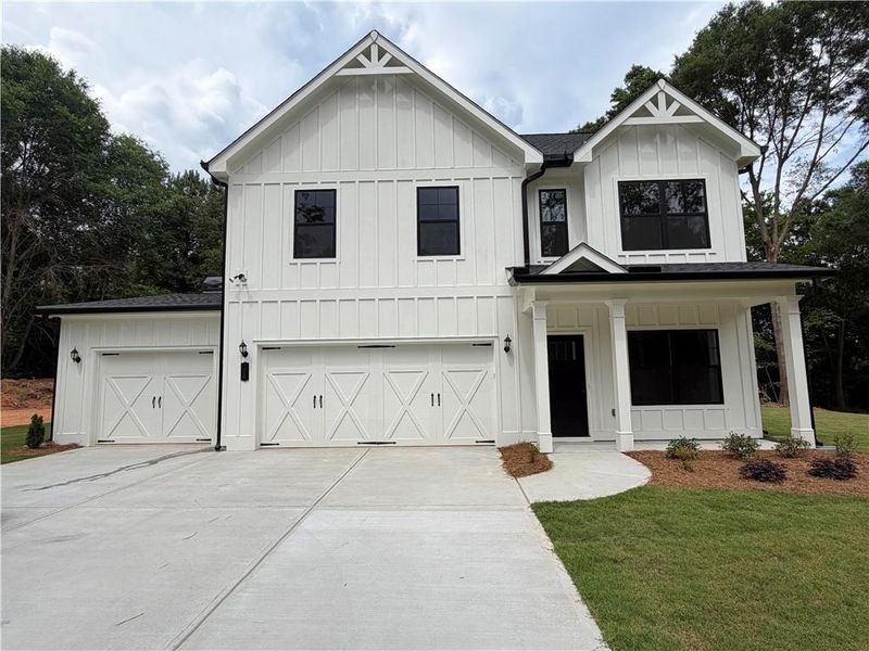 Front exterior of a new home in , Jefferson, GA, highlighting curb appeal (Image 24).