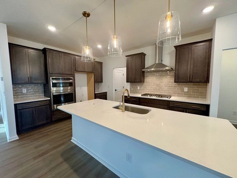 Kitchen featuring AW Collection® Oxford - Matte finishes, light wood, and refined style. Kitchen featuring AW Collection® Oxford - Matte finishes, light wood, and refined style.