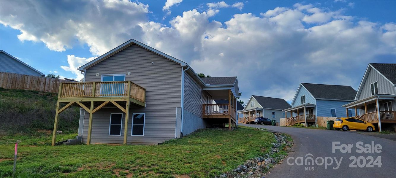 Front exterior of a new home in , Mars Hill, NC, highlighting curb appeal (Image 18).