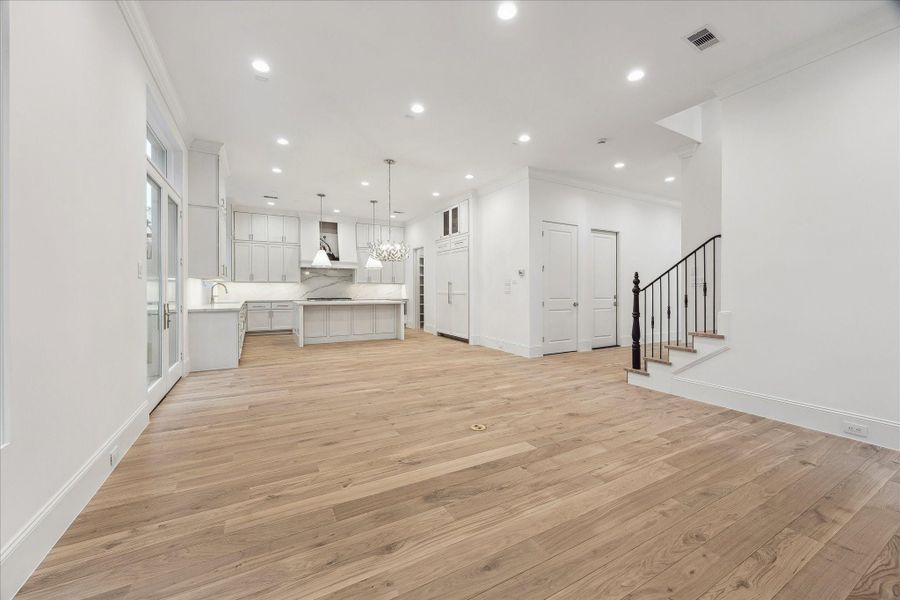 Dining space is located directly off of the living. Ample windows and a set of French doors fill this space withlight.