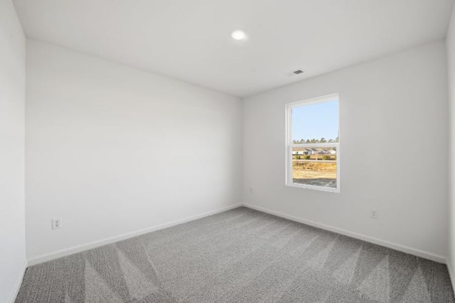 A room with a window. A room with a window.