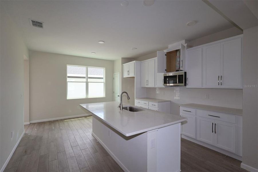 Furnished interior view inside a new home in Center Lake on the Park, St. Cloud (Image 7).