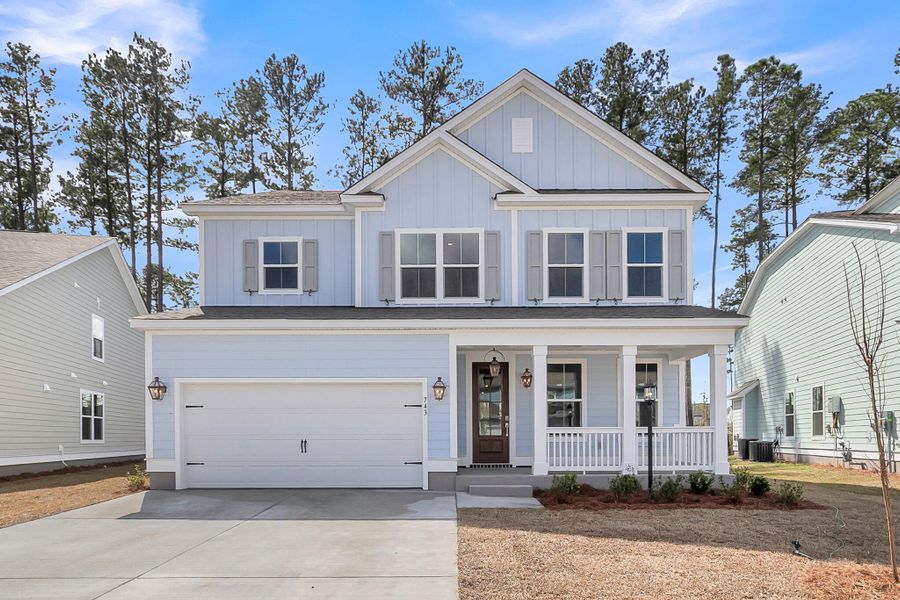 Front exterior of a new home in , Summerville, SC, highlighting curb appeal (Image 1). Front exterior of a new home in , Summerville, SC, highlighting curb appeal (Image 1).