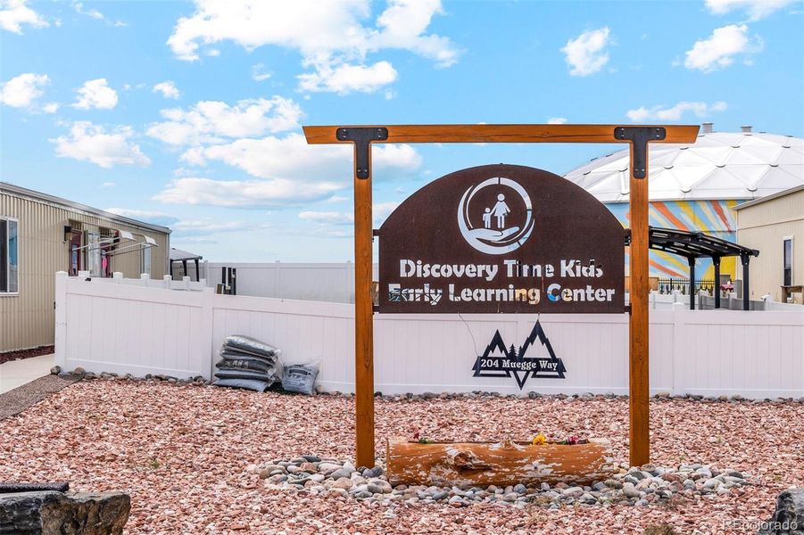 Front exterior of a new home in Bennett Ranch, Bennett, CO, highlighting curb appeal (Image 13).