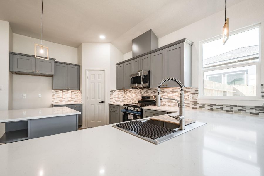 View of countertops in kitchen. View of countertops in kitchen.