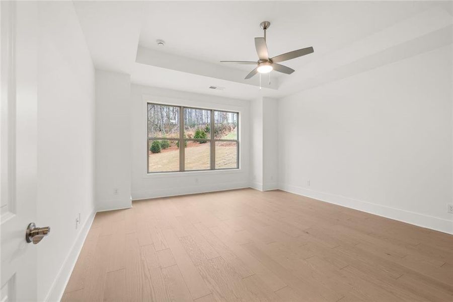 Spacious, unfurnished interior of a new home in Soleil Belmont Park, Canton (Image 47).