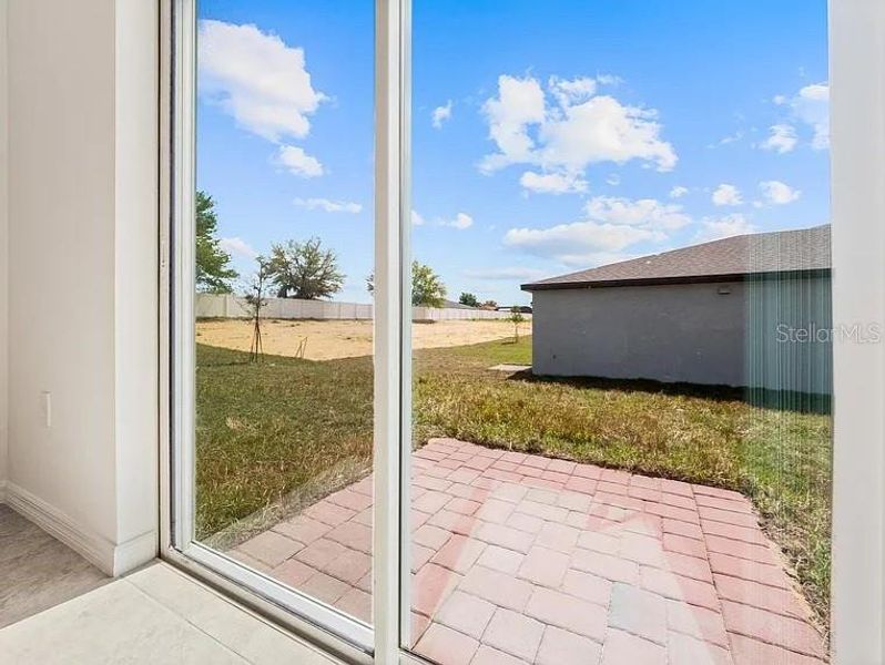 Exterior details and patio area of a home in Deer Run at Crosswinds, Davenport (Image 2). Exterior details and patio area of a home in Deer Run at Crosswinds, Davenport (Image 2).
