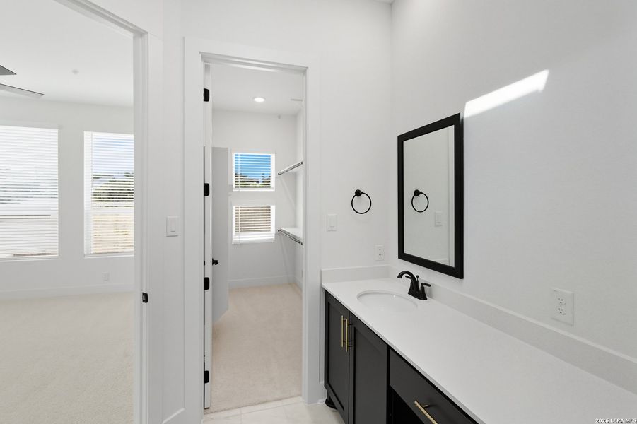 Furnished interior view inside a new home in Centero at Stone Oak, San Antonio (Image 11).
