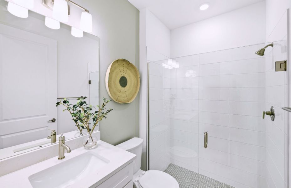 Representative furnished interior of a home built from the Palmary by DiVosta in BeachWalk by Manasota Key, Englewood (Image 8).