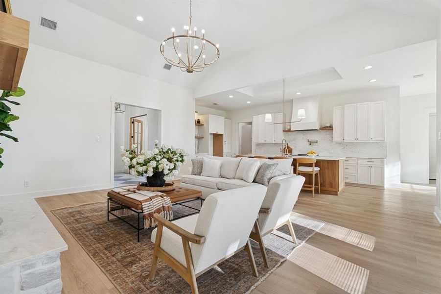Another peek at the foyer, the beautiful French doors to the office, and the ceiling details that lend interest and character to these spaces.