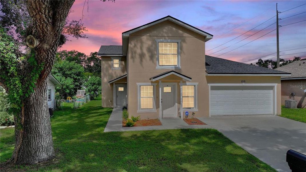 Front exterior of a new home in , Bartow, FL, highlighting curb appeal (Image 28).