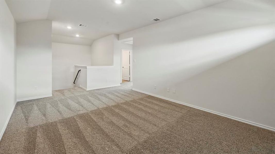 Unfurnished room featuring carpet floors and recessed lighting