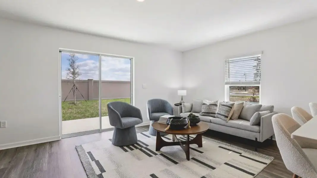 Furnished interior view inside a new home in Atria at Ridgewood Lakes, Davenport (Image 9).