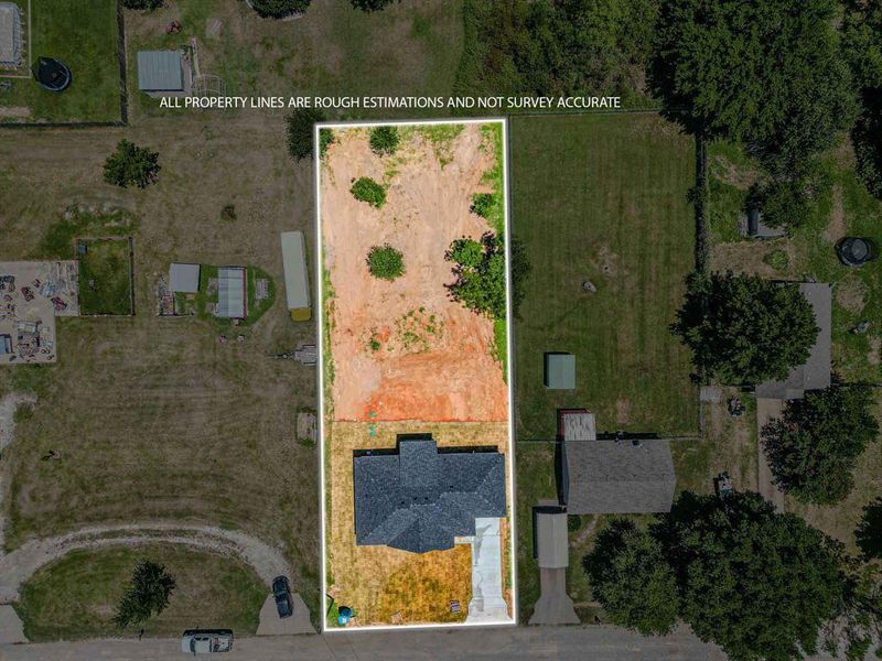 Aerial view of property and surrounding area featuring property parcel outlined Aerial view of property and surrounding area featuring property parcel outlined