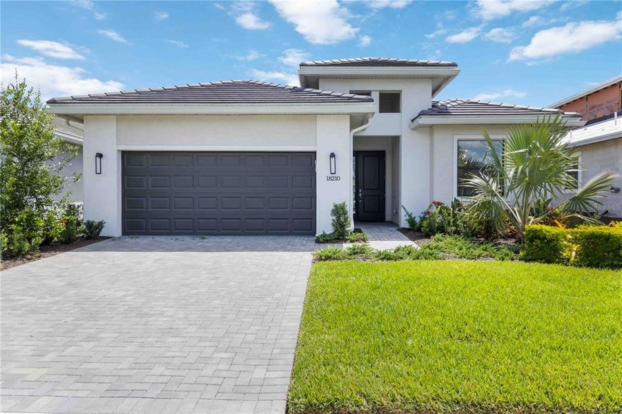 Gorgeous Dania with Tile Roof and Paver Driveway