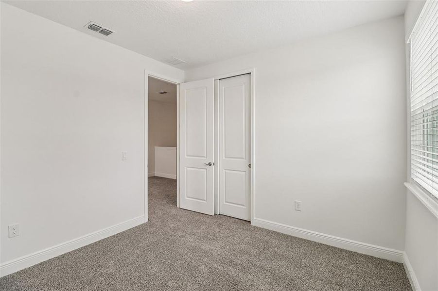 Spacious, unfurnished interior of a new home in Legends Preserve - Signature Series, Daytona Beach (Image 32).