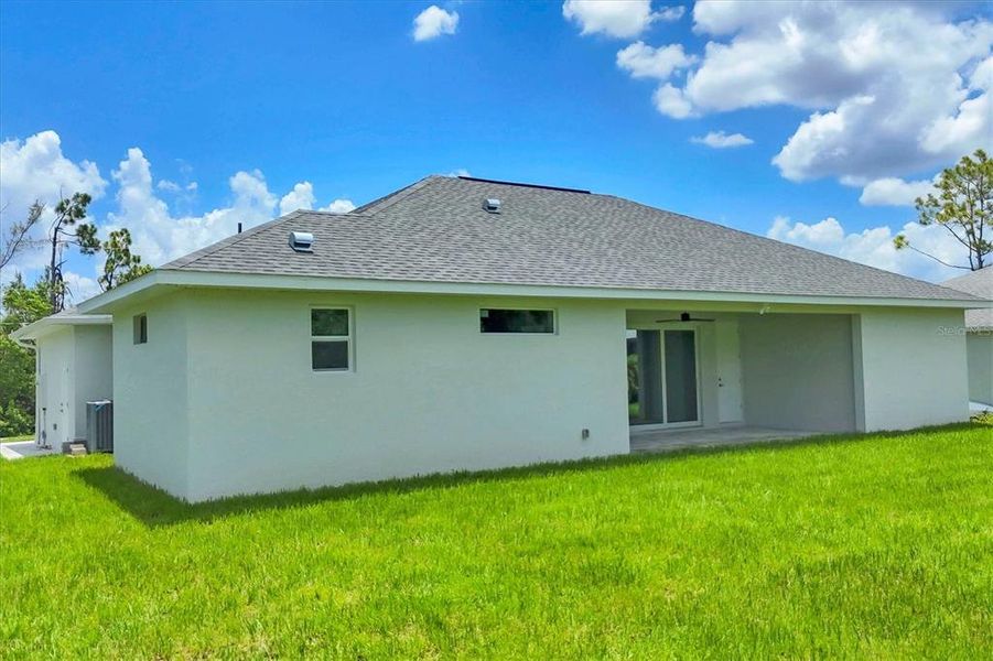 Front exterior of a new home in , Port Charlotte, FL, highlighting curb appeal (Image 25). Front exterior of a new home in , Port Charlotte, FL, highlighting curb appeal (Image 25).