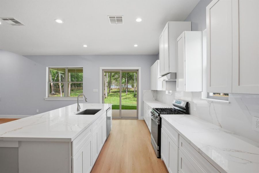 Furnished interior view inside a new home in , Magnolia (Image 13).