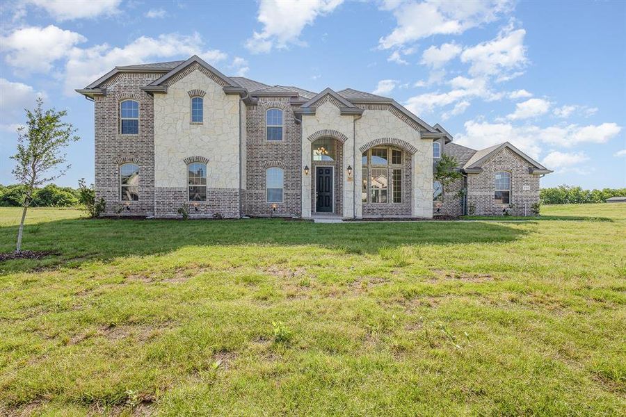Front exterior of a new home in , Waxahachie, TX, highlighting curb appeal (Image 22).